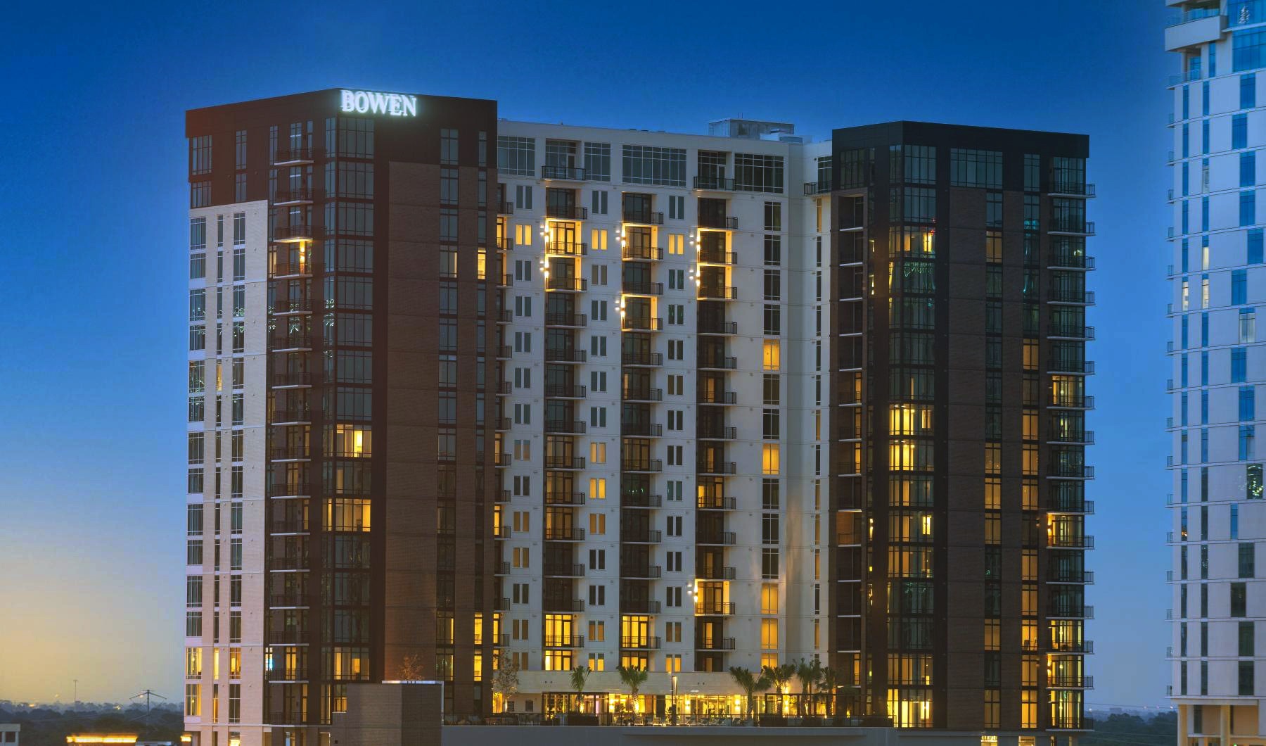 The essence of exceptional living a tall building with many windows