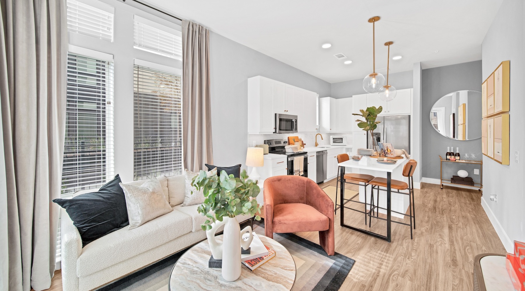 Luxury High-Rise Apartments in Houston living room with a large window and open spaces