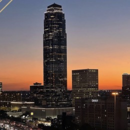 a city skyline at sunset
